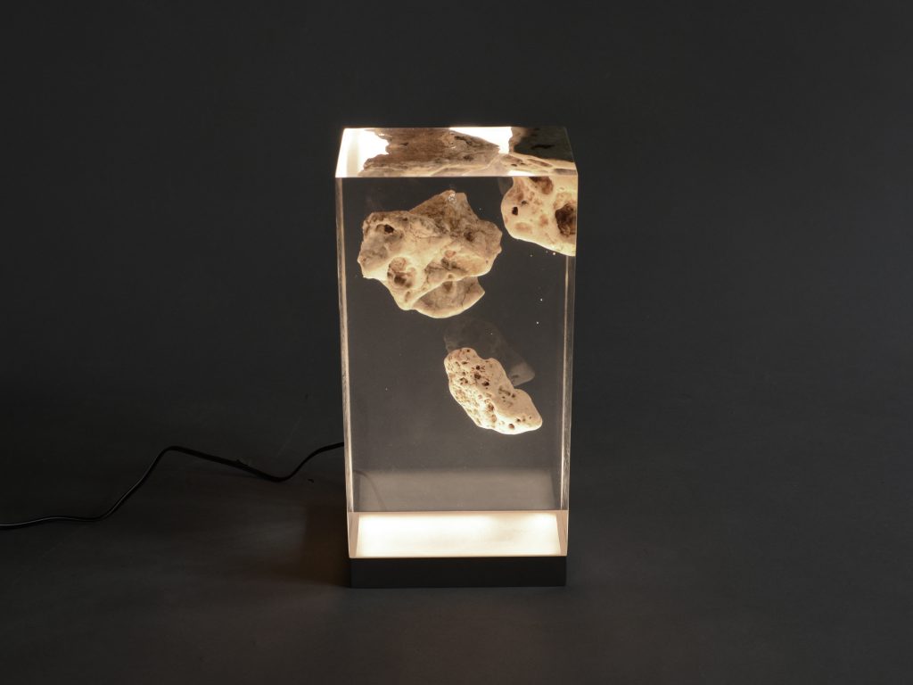 Floating Karst Lamp with a rectangular shape, featuring a natural stone base with a transparent resin inlay and a white lampshade, set against a white background.