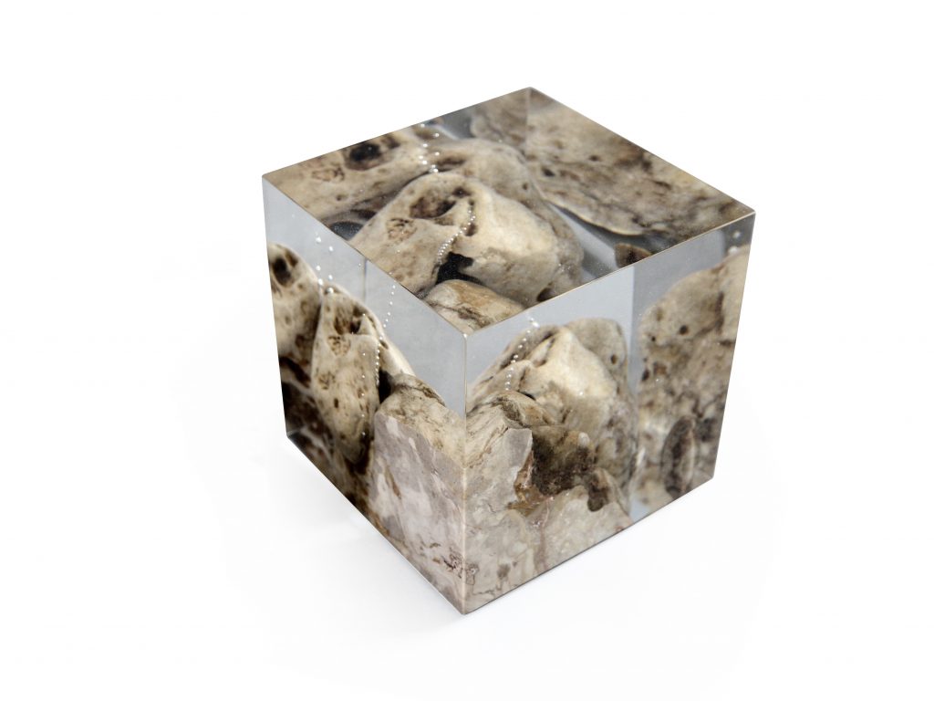 Karst Bookend with a geometric design, featuring a natural stone finish, set against a white background.