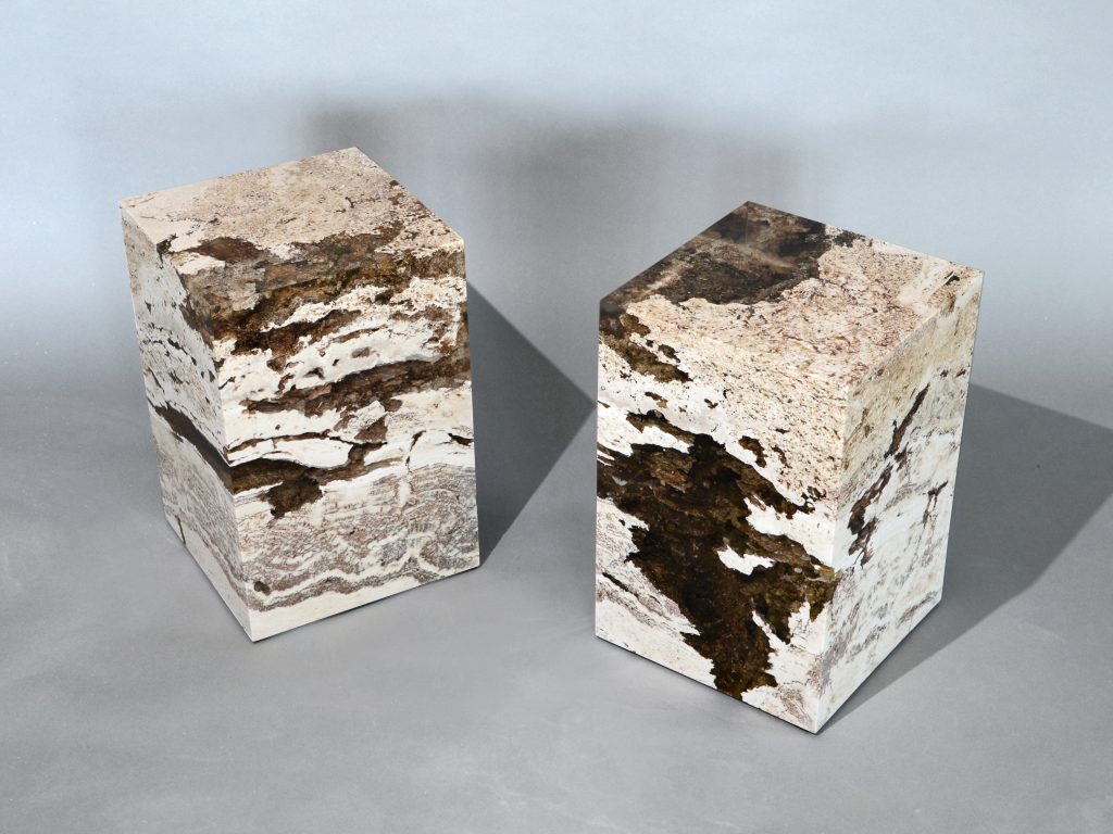 small sculpture made of natural stone covered in resin completely in a tone of brown and beige