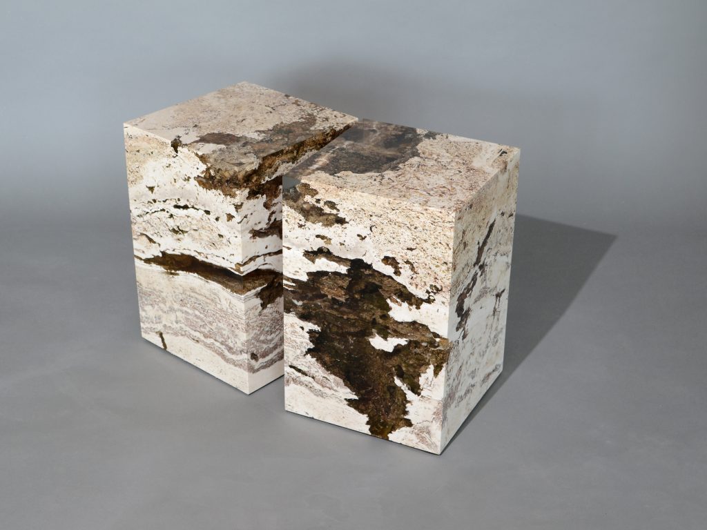 small sculpture made of natural stone covered in resin completely in a tone of brown and beige