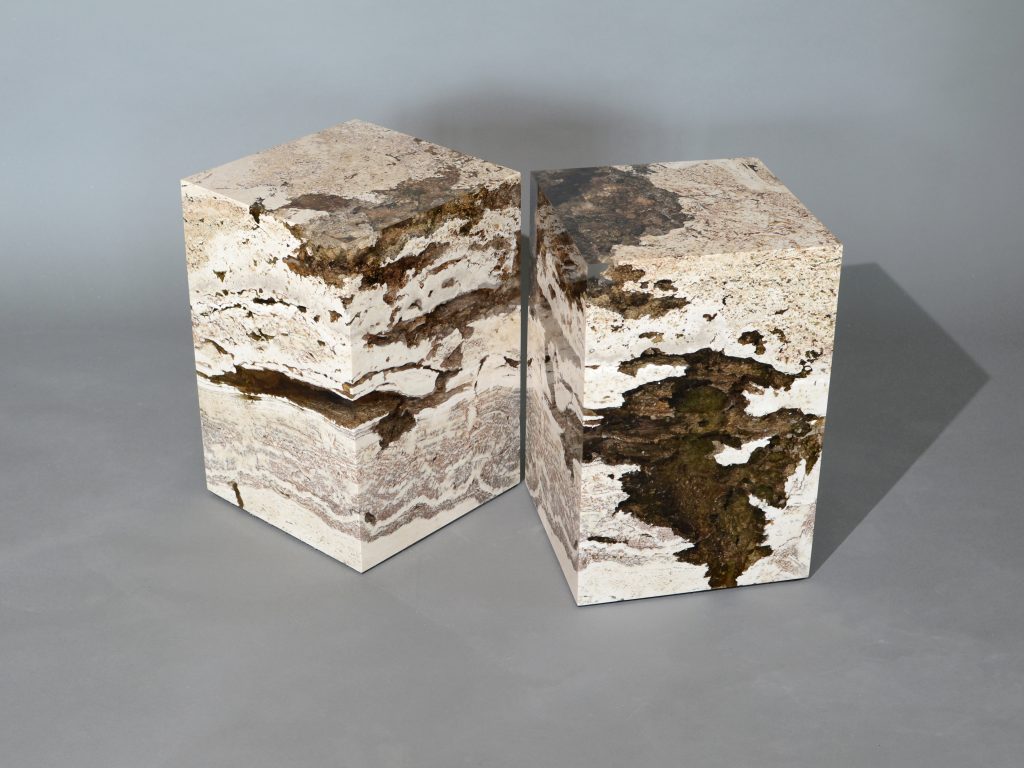 small sculpture made of natural stone covered in resin completely in a tone of brown and beige
