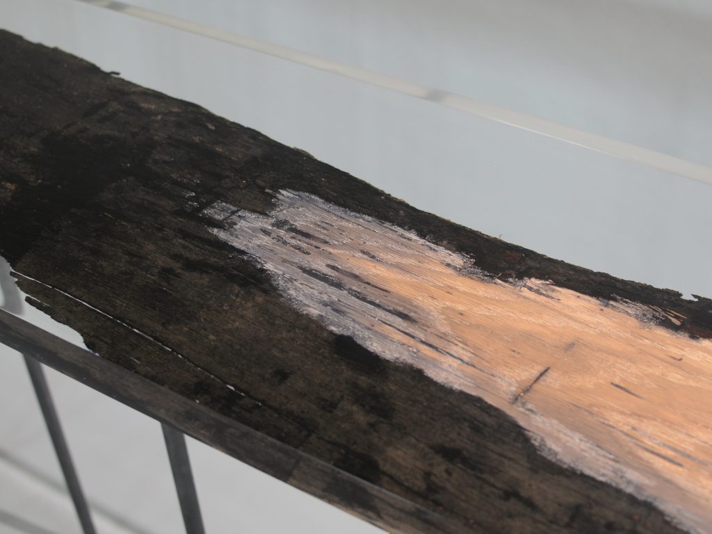 bar table made of resin and natural wood in a brown and transparent tone