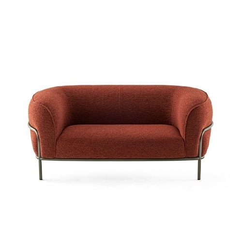 Sophie Sofa: red fabric sofa with black base on a white background.