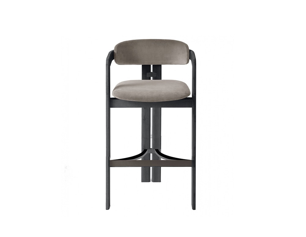 A refined blend of comfort and structure, this stool features a sleek frame and plush upholstery, perfect for any modern setting