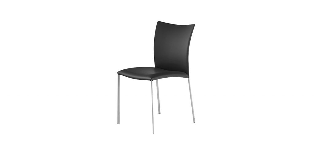 chair made on wooden legs upholstered in leather of a white tone on a black background