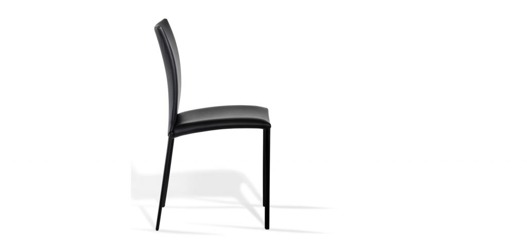 chair made of four steel legs and upholstered in black leather on a white background