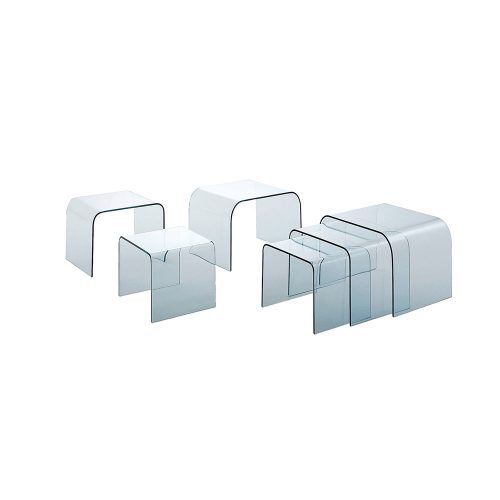 set of three coffee tables made of transparent or lacquered glass base on a white background