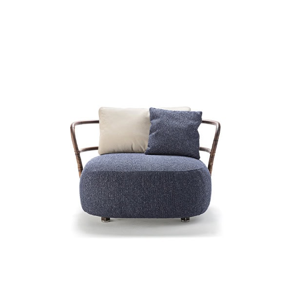 A compact front view of the Jungle Armchair featuring a curved wooden frame plush blue cushion and dual-tone backrest pillows for a modern look