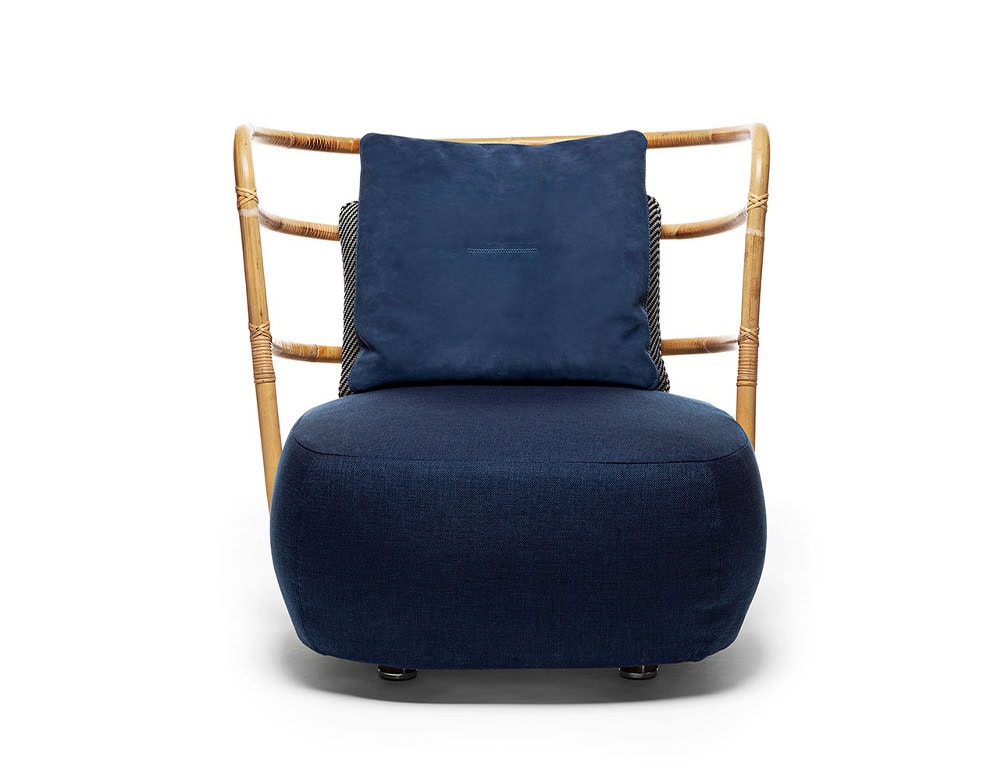 Jungle Armchair Slim upholstered in blue fabric and brown wooden structure on a white background.