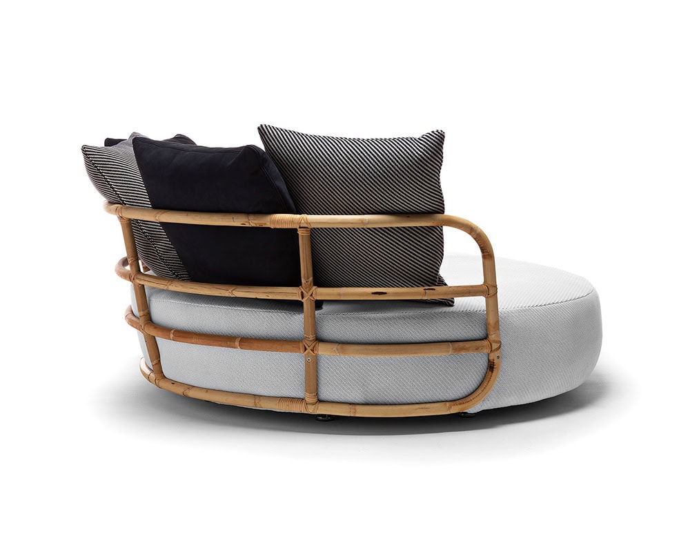 Jungle Daybed upholstered in gray fabric and brown wooden structure on a white background.