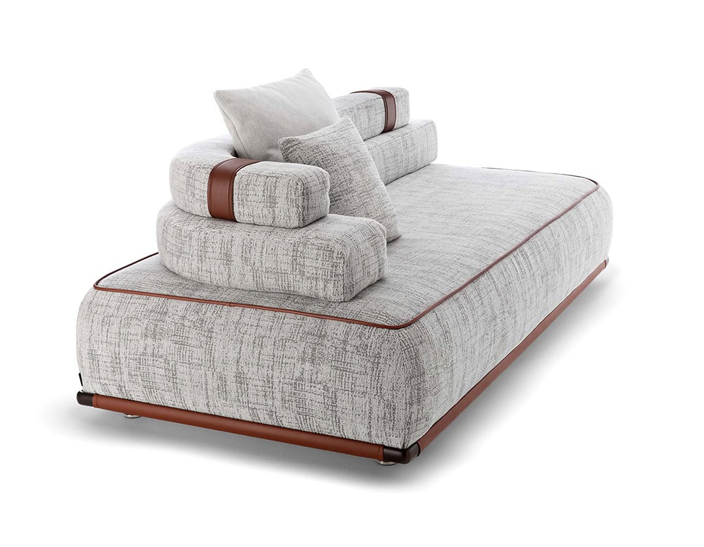 Panarea Sofa in gray and brown fabric with backrest on a white background.