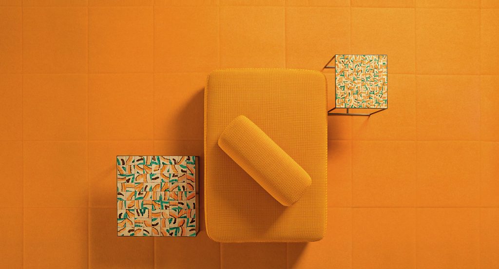 Two Cocci side tables, black steel frame, brown, orange, green and white square ceramic top in a living room.