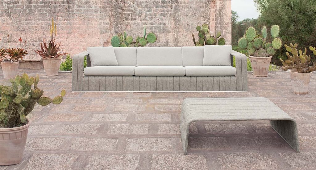 Square Frame Coffee Table, upholstery in white rope braids in a terrace.