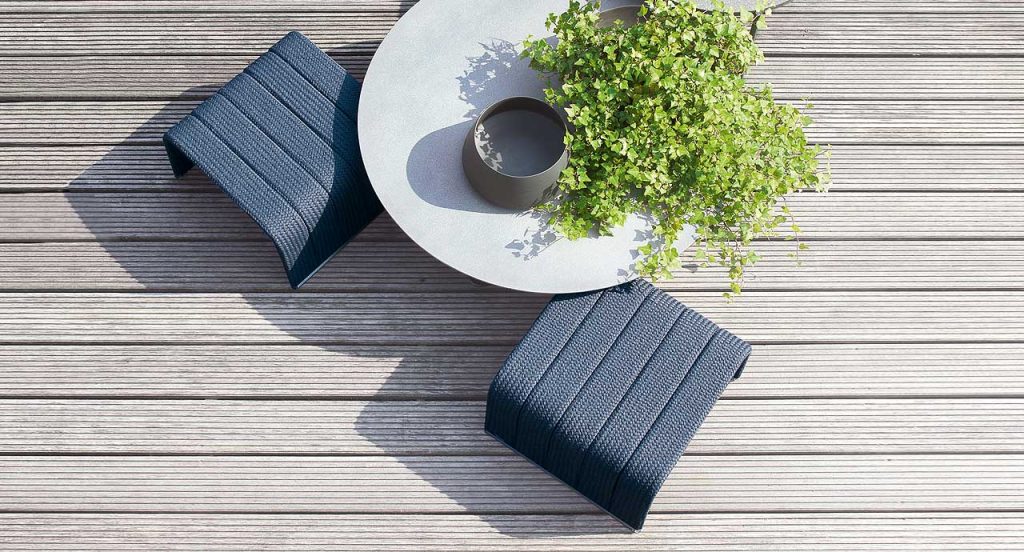 Two square Frame Coffee Table, upholstery in blue rope braids in a terrace.