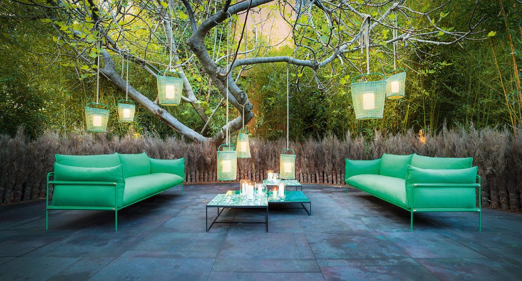Eight Lanternas, structure in green steel, cover in green brige kimia fabric in a terrace.