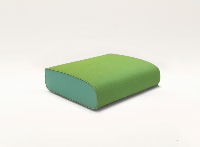Ola Pouf upholstery in green and blue fabric on a white background.