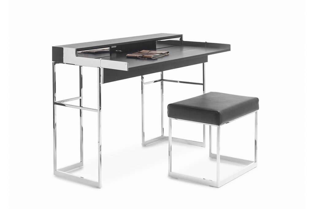 desk made of stainless steel base drawers in leather of a black color tone on a white background