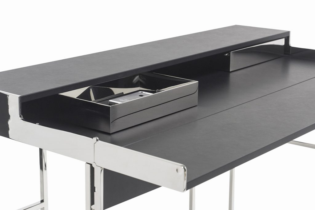 desktop finishes in stainless steel and black wood on a white background