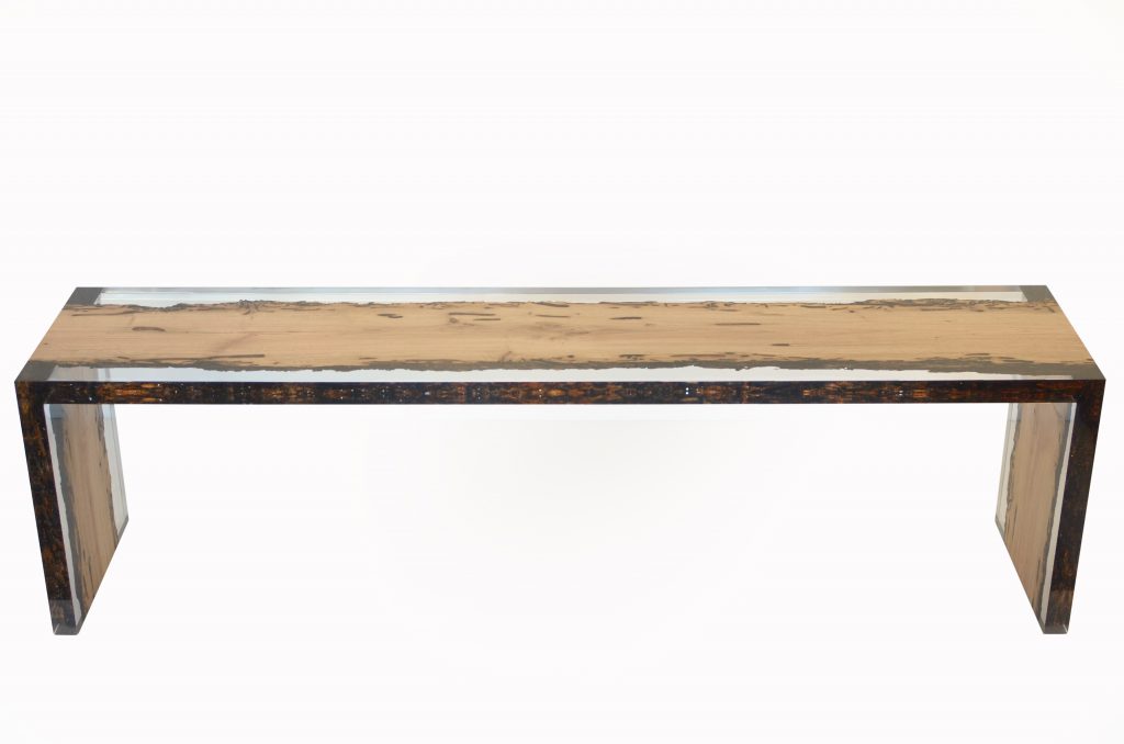 Bent Bench with a rectangular shape, made of solid wood with a natural finish and featuring a transparent resin inlay, on a white background.