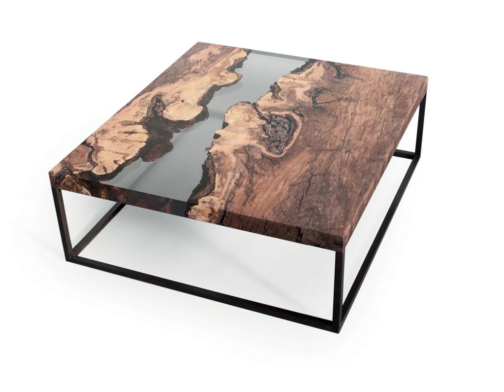Creek Low Table with a rectangular shape, made of solid wood with a natural finish and featuring a transparent resin inlay, set against a white background.