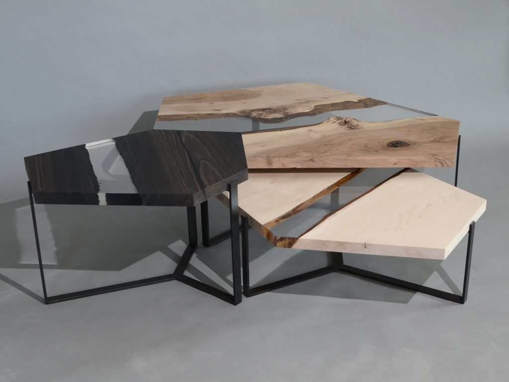 Crystal Wood Trio Low Tables featuring three tables with polygonal shapes, made of solid wood with natural finishes and transparent resin inlays, on a white background.
