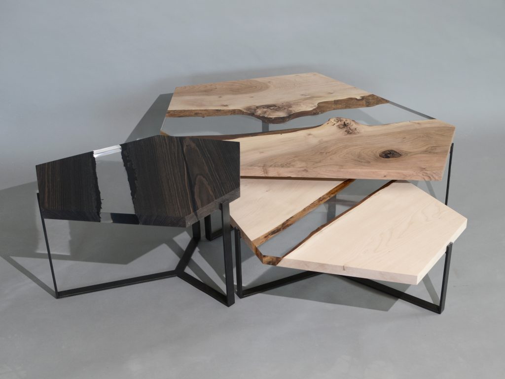 Crystal Wood Trio Low Tables featuring three tables with polygonal shapes, made of solid wood with natural finishes and transparent resin inlays, on a white background.