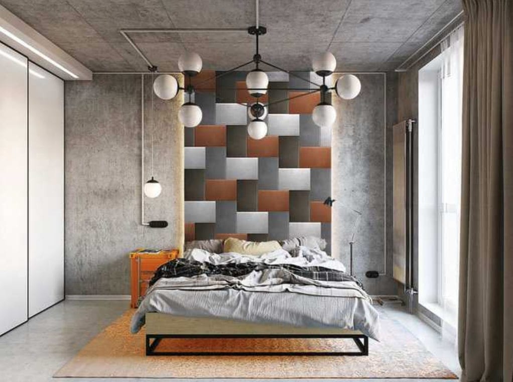 Delirium mosaic featuring rectangle patterns in shades of black, white ans red on a wall.