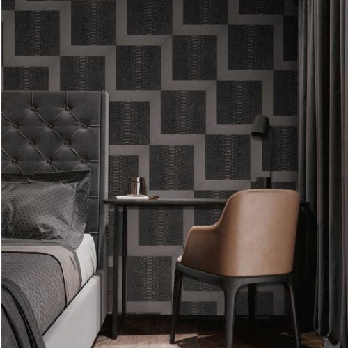 Icon mosaic in beige and brown with square and rectangular patterns, set against a wall.