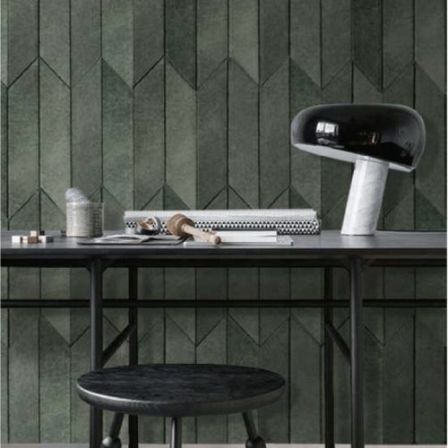 Omnia mosaic in green and brown with all-encompassing patterns, on a wall.