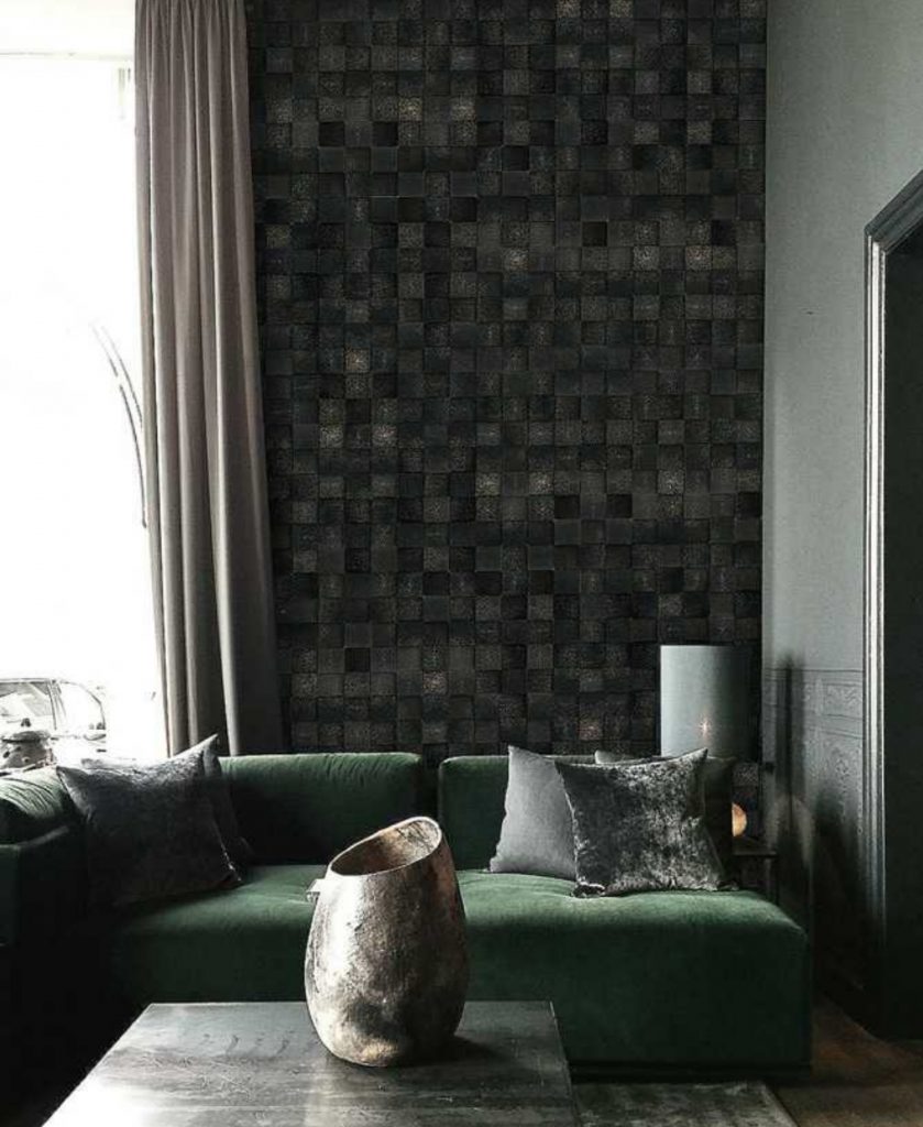 Pure3D mosaic in beige and brown with a three-dimensional effect, set against a wall.