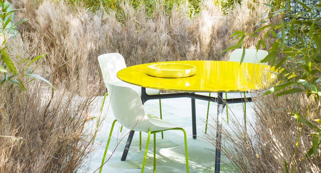 Yellow Sika basket in an outdoor dining room.