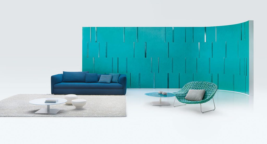 Blue Walt Sofa of three seats with high back in a living room.