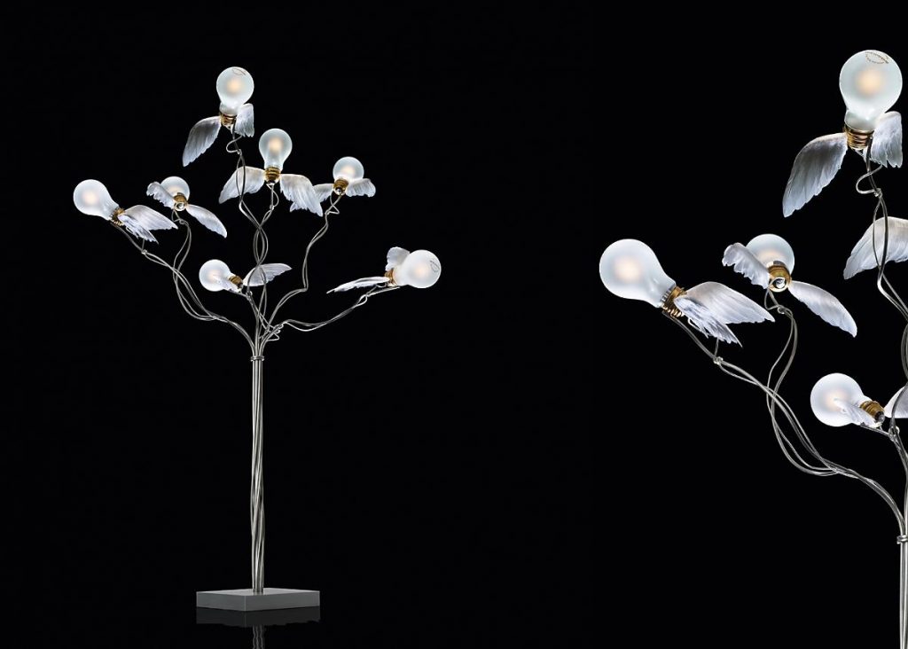 Birdies Busch lamp with lightbulbs that have wings attached to the sides of them