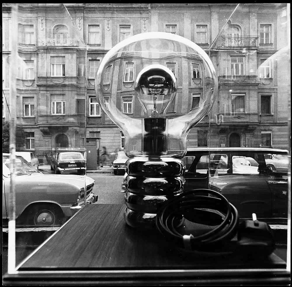 A black and white photo of Bulb on a table in a diner setting