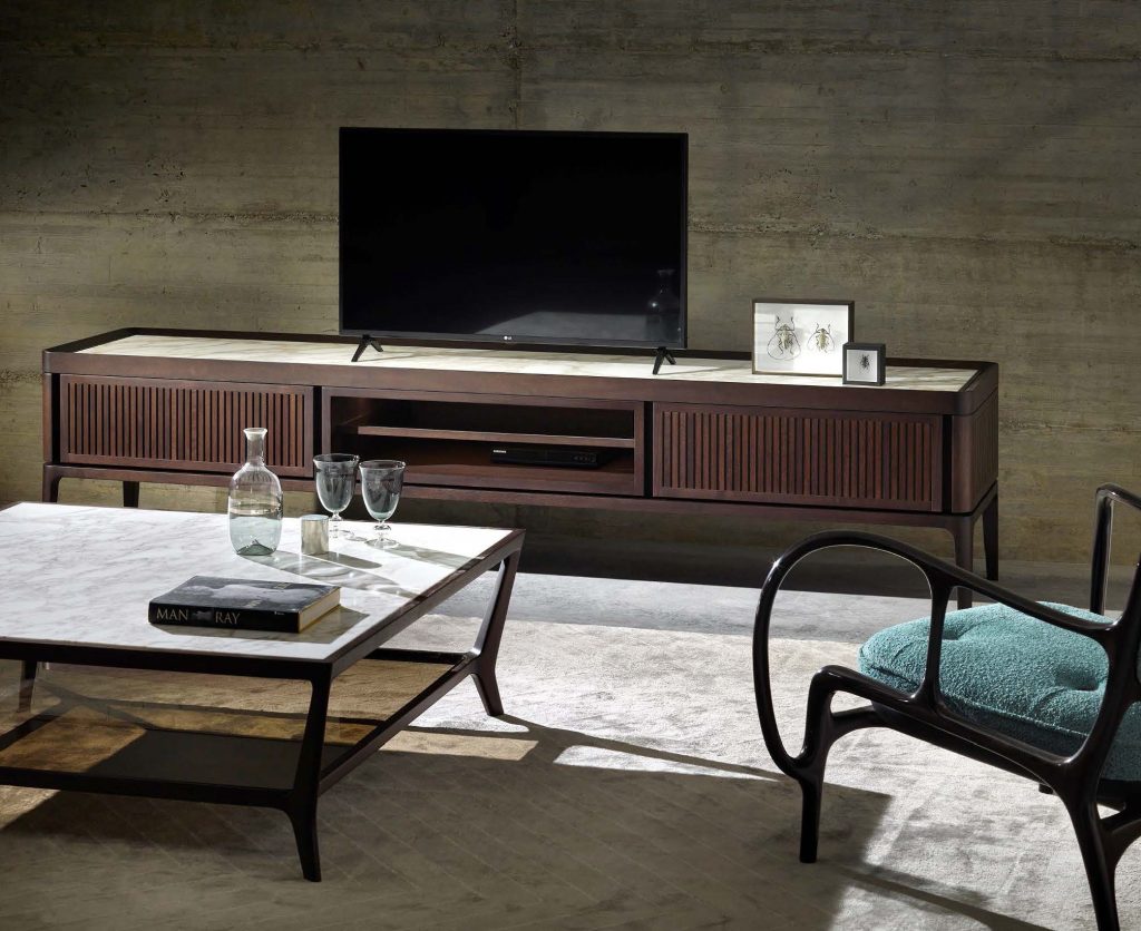 furniture made of brown wood and white marble tops with multimedia drawers for uses in a living room