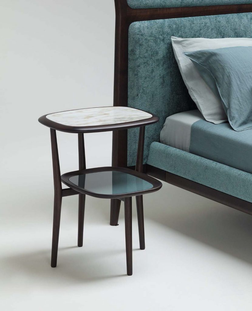 small two-level nightstand made of cirstal wood and marble base in a white, black and blue tone