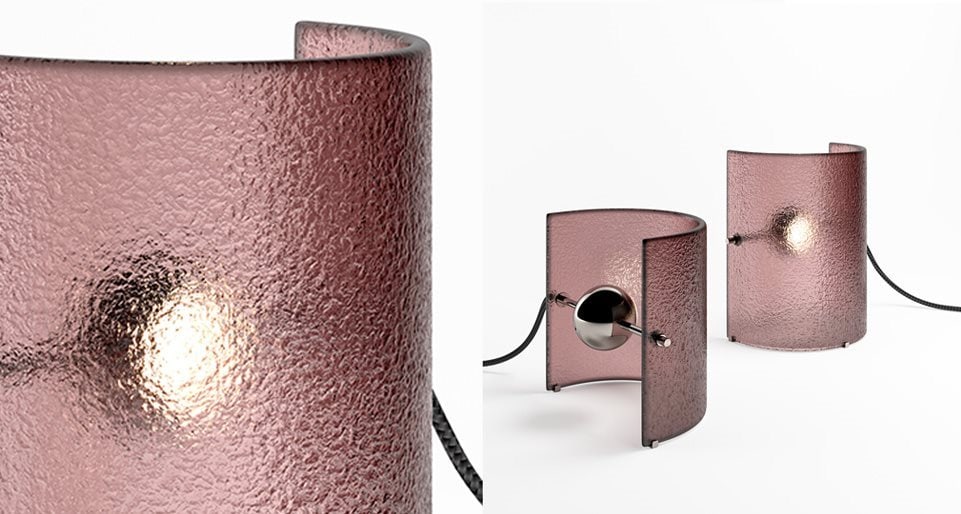 table lamp made of curved fused glass made on a black metal base in a pink tone on a white background