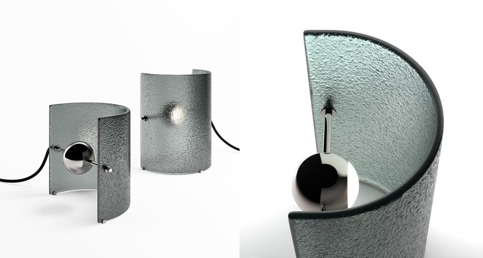 table lamp made of curved fused glass made on a black metal base in a ligth blue on a white background