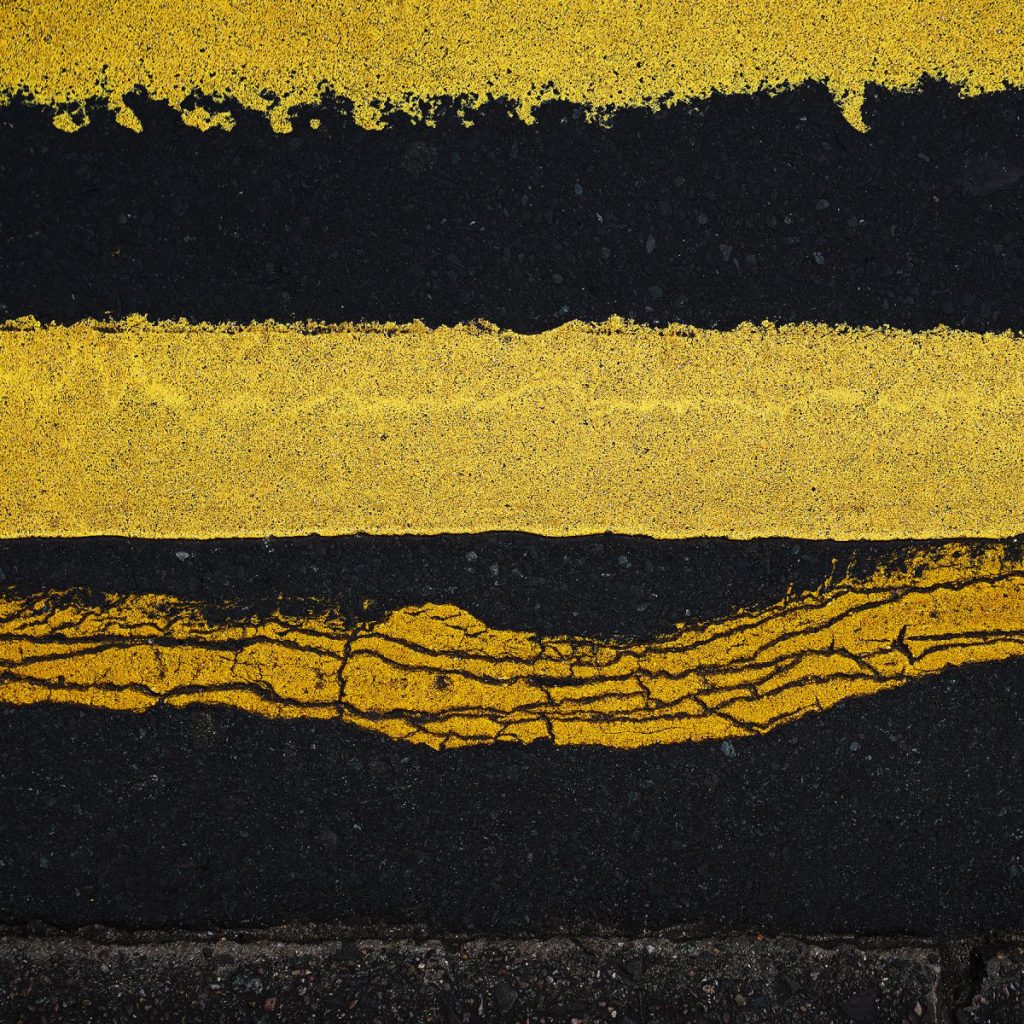 Archival pigment print in yellow color tones on a black