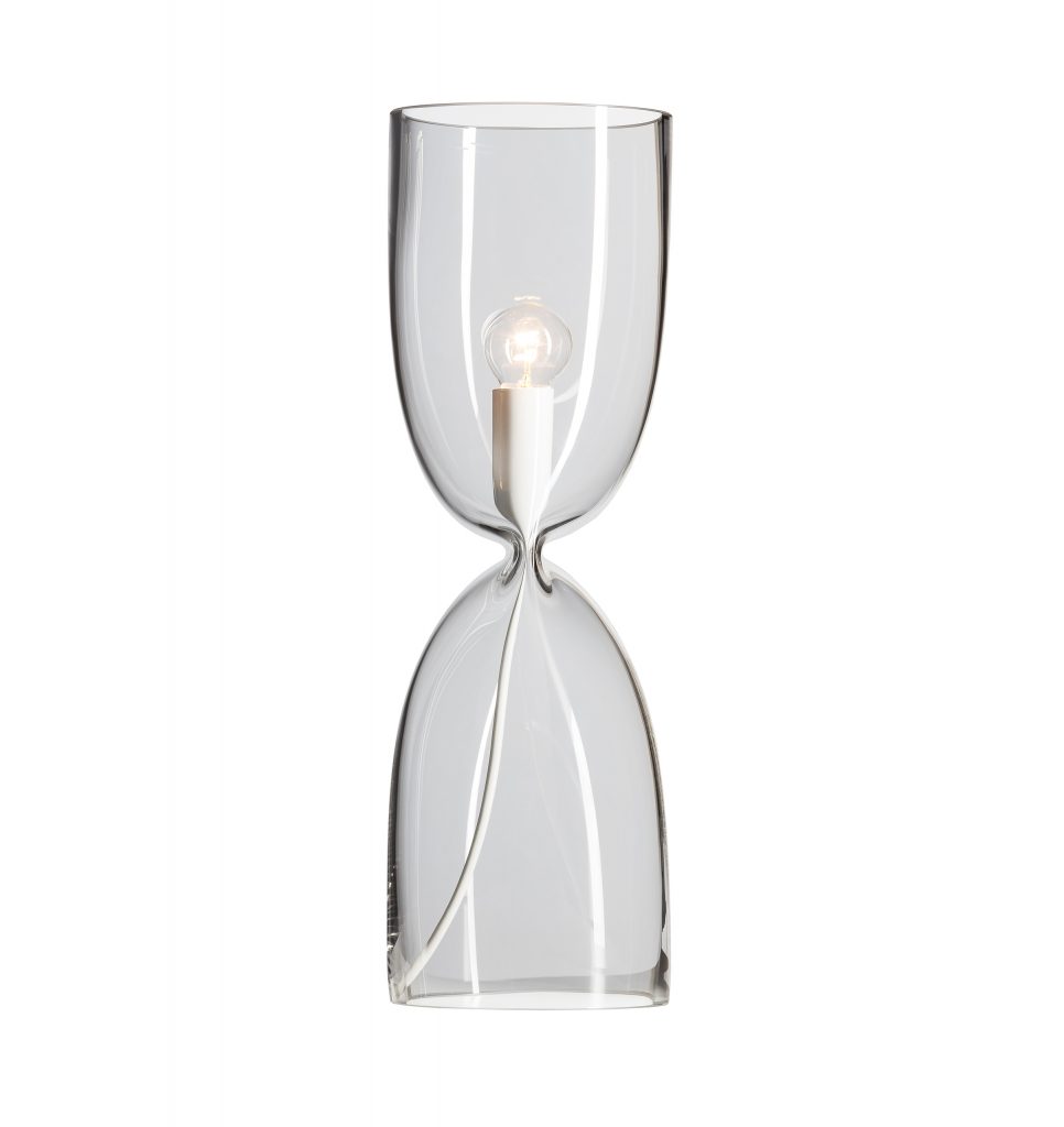 lamp made from blown glass molded in a singular shape on a white background
