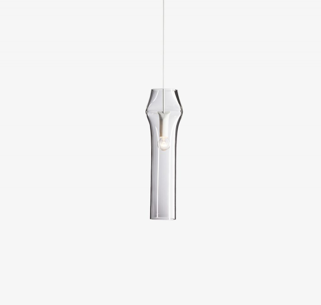 Unique shaped lamp made of bohemian glass base with steel base on a white background