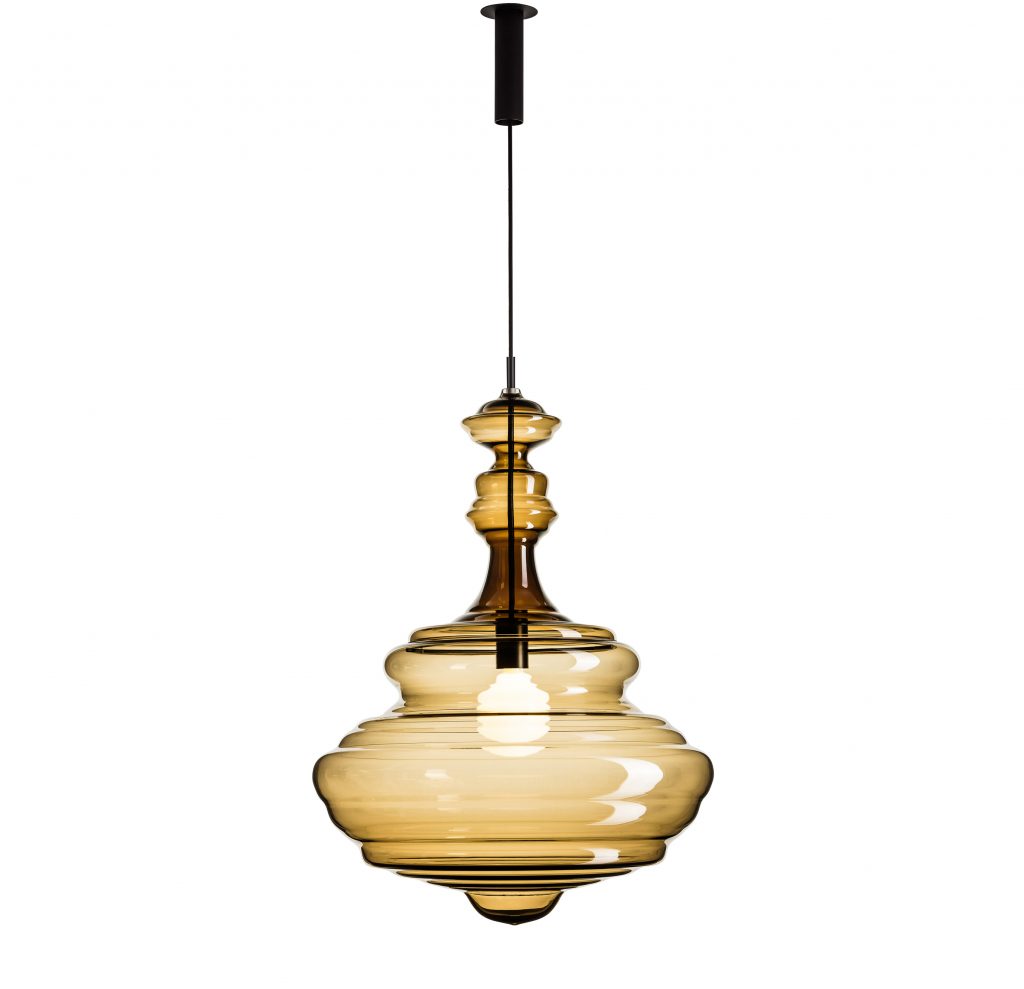 large chandelier rotating on its own axis made from blown bohemian glass in a brown tone on a white background