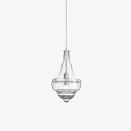 small lamp made from blown glass molded in the shape of a drop on a white background