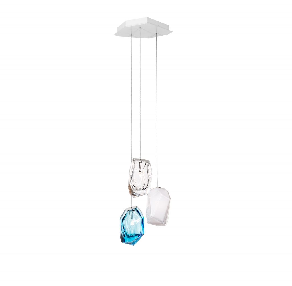 small lamp made in the shape of three cirstal stones in white and blue color tone on a white background