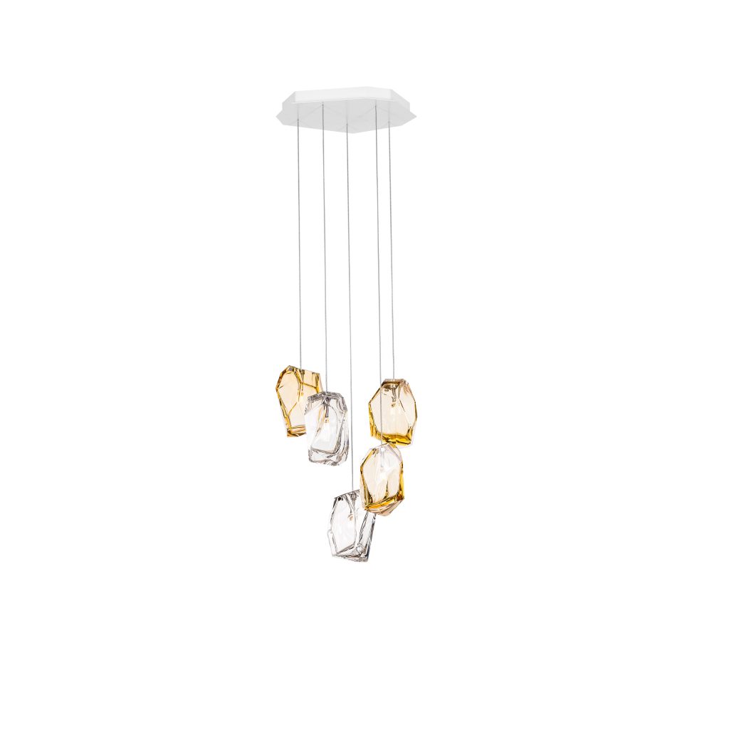 small lamp made in the shape of five cirstal stones in white and gold tone on a white background