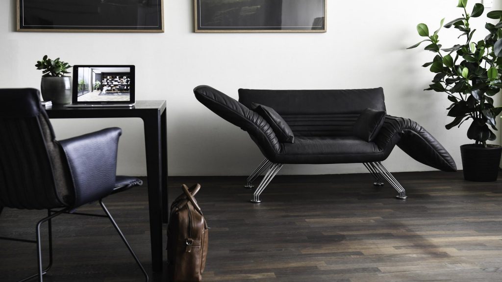 Multifunctional chaise made of aluminum base and upholstered in black leather