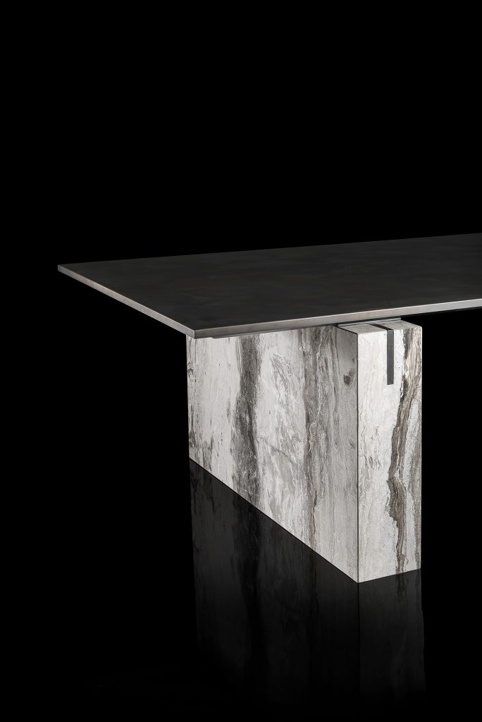 table made of titanium stone and steel in a black and gray color tone on a black background