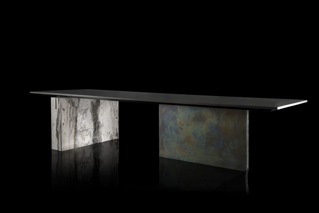 table made of black painted steel base and 20cm top in titanium stone in a gray tone
