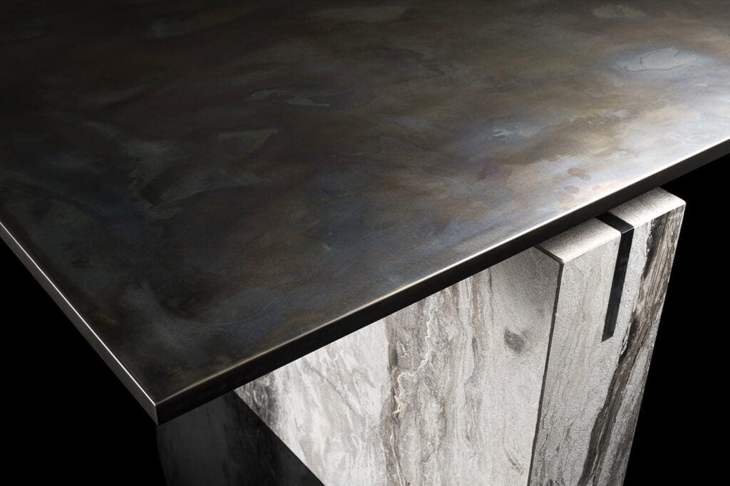 table made of titanium stone and steel in a black and gray color tone on a black background