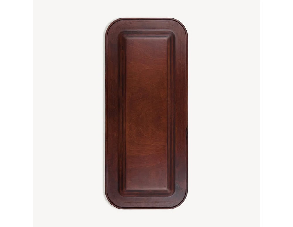 This elegant wooden tray highlights timeless craftsmanship with its rich finish and smooth rounded edges for a modern classic look.